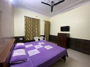 Katil atau katil-katil dalam bilik di Krishna Aangan