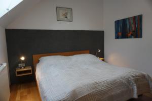 Letto o letti in una camera di Weingut Bäuerl