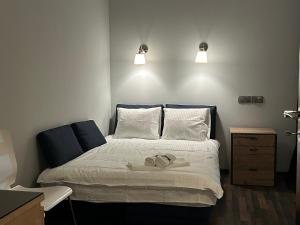 En eller flere senge i et værelse på Nad rzeką XL Luxury