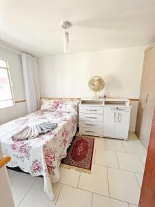 Katil atau katil-katil dalam bilik di Apartamento