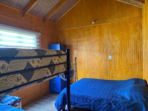 Двуетажно легло или двуетажни легла в стая в Cabañas El Marmol