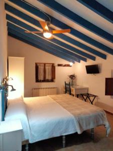 Ένα ή περισσότερα κρεβάτια σε δωμάτιο στο Hostal los Aromas