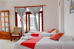 Voodi või voodid majutusasutuse Gran Hostal Tintorera toas