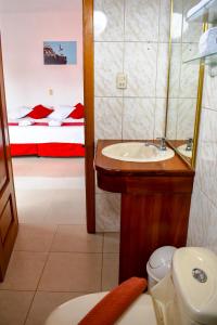 Vannituba majutusasutuses Gran Hostal Tintorera
