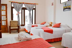 Voodi või voodid majutusasutuse Gran Hostal Tintorera toas