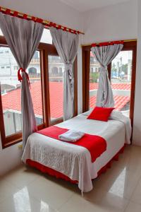 Voodi või voodid majutusasutuse Gran Hostal Tintorera toas