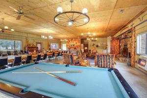 a pool table in a room with chairs at Studio Cabin on Black Diamond Ranch Hike and Fish 