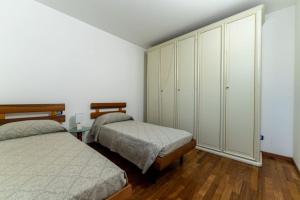 Postel nebo postele na pokoji v ubytování DA ERIK E NICHI