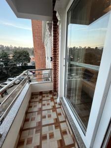 a balcony with a view of a city at Hotel prime suite in Kathmandu