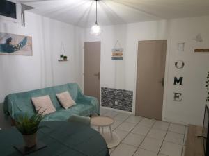 Posezení v ubytování Maisonnette abj