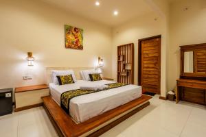 Postel nebo postele na pokoji v ubytování Paradise Villa Gili Air