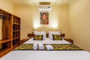 Postel nebo postele na pokoji v ubytování Paradise Villa Gili Air