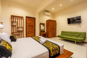 Postel nebo postele na pokoji v ubytování Paradise Villa Gili Air