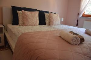 A bed or beds in a room at Villa Csilla elegant house