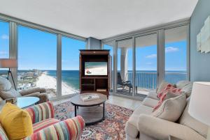 a living room with a view of the ocean at Island Tower 2301 in Gulf Shores