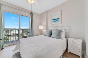 Postel nebo postele na pokoji v ubytování Island Royale 601 + 44 fotografií