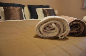 A bed or beds in a room at Villa Csilla elegant house