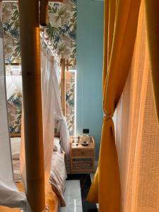 Postel nebo postele na pokoji v ubytování B&B Principe Amedeo