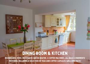 a kitchen with a table and a dining room and kitchen at Pardubsky Apartments in Ljubljana