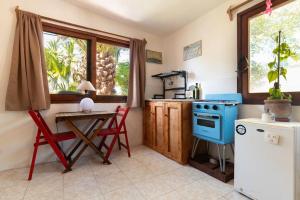 Η κουζίνα ή μικρή κουζίνα στο Casita playera y confortable