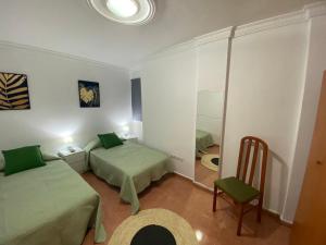 Tempat tidur dalam kamar di Apartamento en costa de Telde