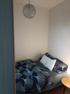 Tempat tidur dalam kamar di Rajtarska Apartament