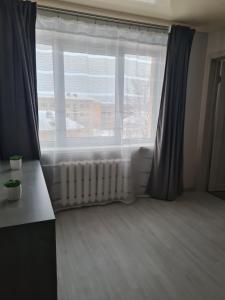 Predel za sedenje v nastanitvi Vironia Apart