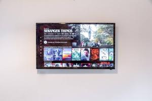 a poster for stranger things is on a wall at Guggenheim House [ Dorsoduro ] in Venice