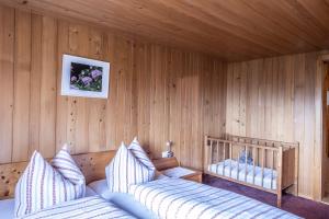 Postel nebo postele na pokoji v ubytování Bauernhof Hammerer