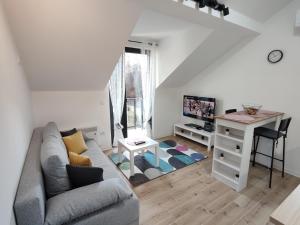 Et opholdsområde på DIVNEST apartman