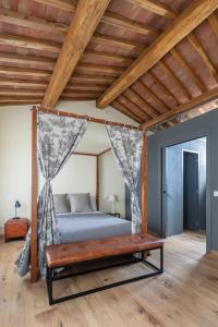 En eller flere senge i et værelse på Tuscany View Montalcino