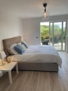 Postel nebo postele na pokoji v ubytování Stay Skelligs