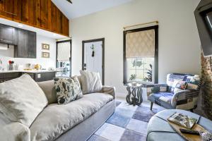 a living room with a couch and a table at New! Historic 1bed/1bath Suite Steps to River St! in Savannah