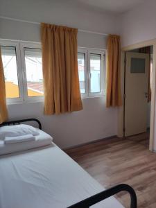 Кровать или кровати в номере Vila dos Avós
