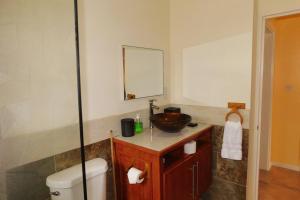 Ein Badezimmer in der Unterkunft Tropical Home Oasis