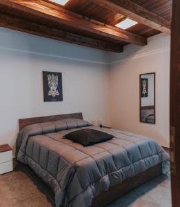 Ένα ή περισσότερα κρεβάτια σε δωμάτιο στο CASA VACANZE VILLA EMILIO