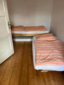 En eller flere senge i et værelse på TENNIS LIFE ŠUMPERK