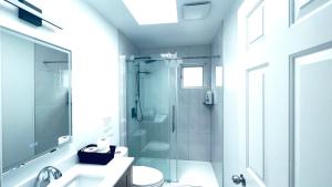 a white bathroom with a shower and a sink at Richmond Cozy Place 2 in Richmond +35 photos