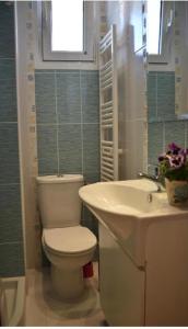 A bathroom at Small apartment, great view!
