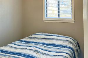 Tempat tidur dalam kamar di Blue Haven 3