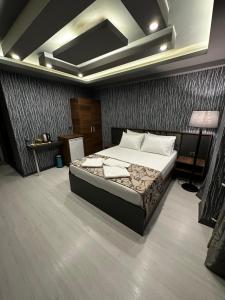 a bedroom with a bed in a room at Loft Suite Residence in Bursa