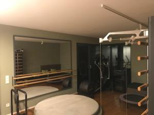 a room with two bunk beds and a mirror at Casaverde in Hofheim am Taunus