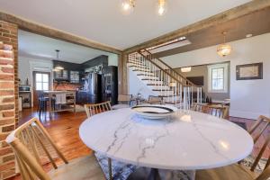 a kitchen and dining room with a table and chairs at The Tannery in Lancaster