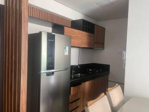 A cozinha ou kitchenette de Apartamento em Ponta Verde