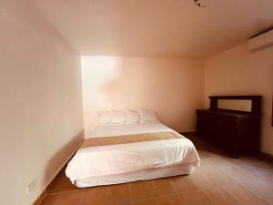 Postel nebo postele na pokoji v ubytování Casalinda San Miguel