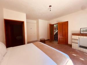 Postel nebo postele na pokoji v ubytování Casalinda San Miguel