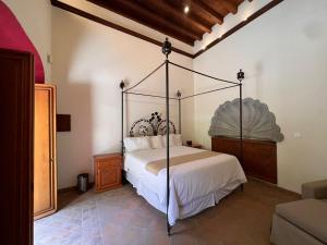 Postel nebo postele na pokoji v ubytování Casalinda San Miguel