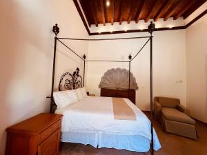 Postel nebo postele na pokoji v ubytování Casalinda San Miguel