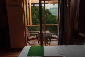 Afbeelding uit fotogalerij van treevillawayanad in Vythiri