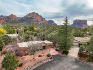 an aerial view of a house with mountains in the background at Sedona Retreat W/ Tesla Mobile Charger in Sedona